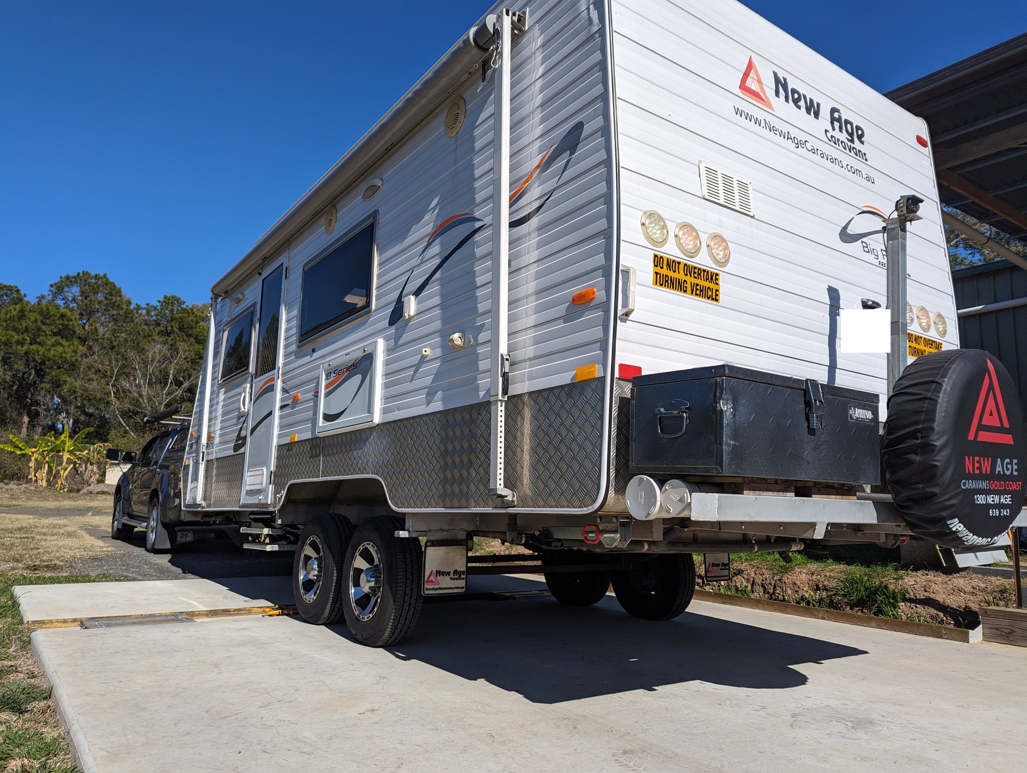 Tow vehicle and caravan being weighed